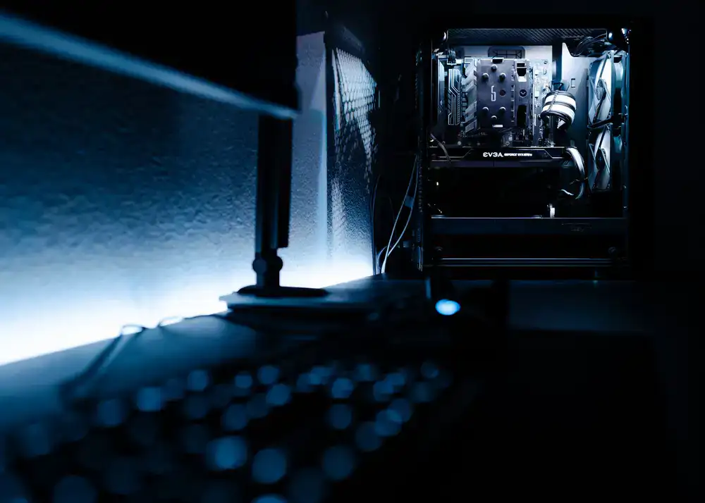 Close up of a mechanical keyboard and high refresh rate monitor