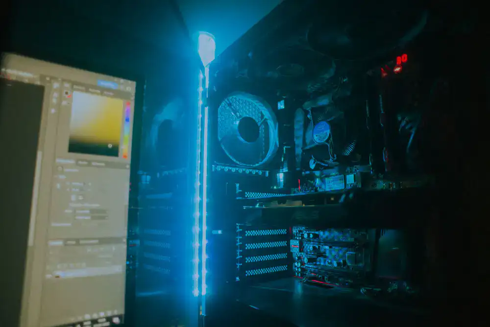 Gamers competing on high-end RGB setups inside the lounge