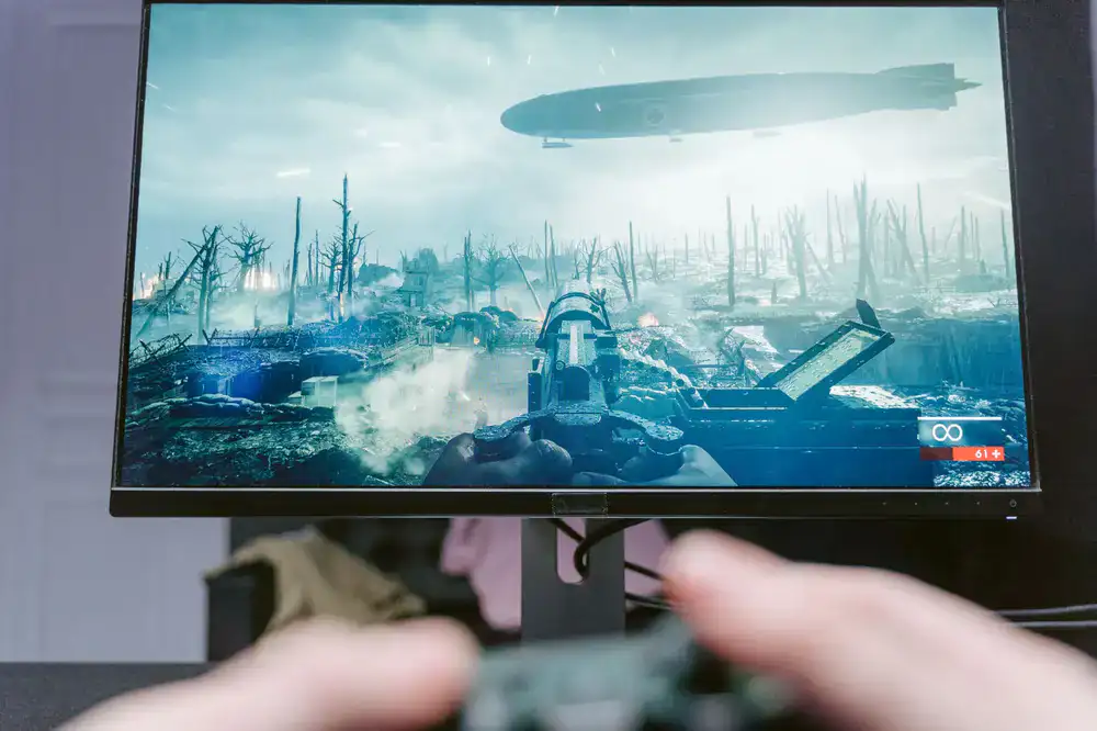 High refresh rate gaming monitor showing a fast-paced shooter game